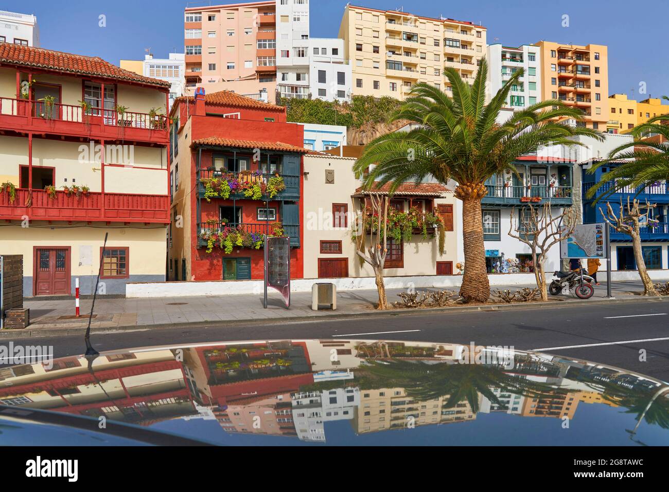 typical old town houses with wooden balconies on the Avenida Maritima