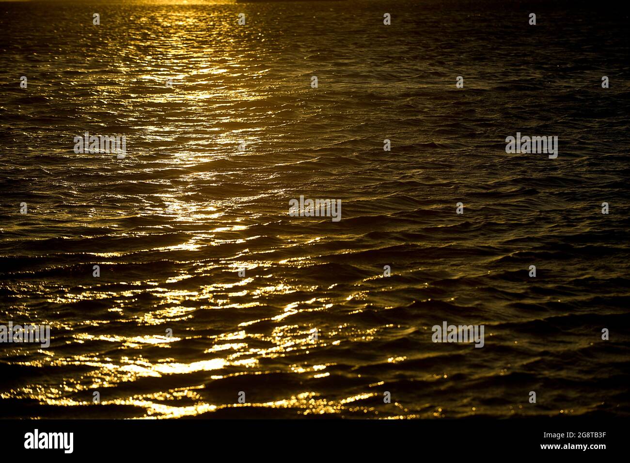 sun reflecting on water, Australia Stock Photo