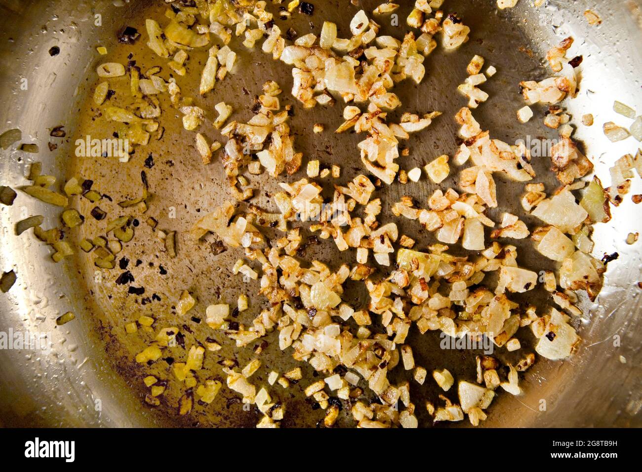 Roasted onion in pan Stock Photo