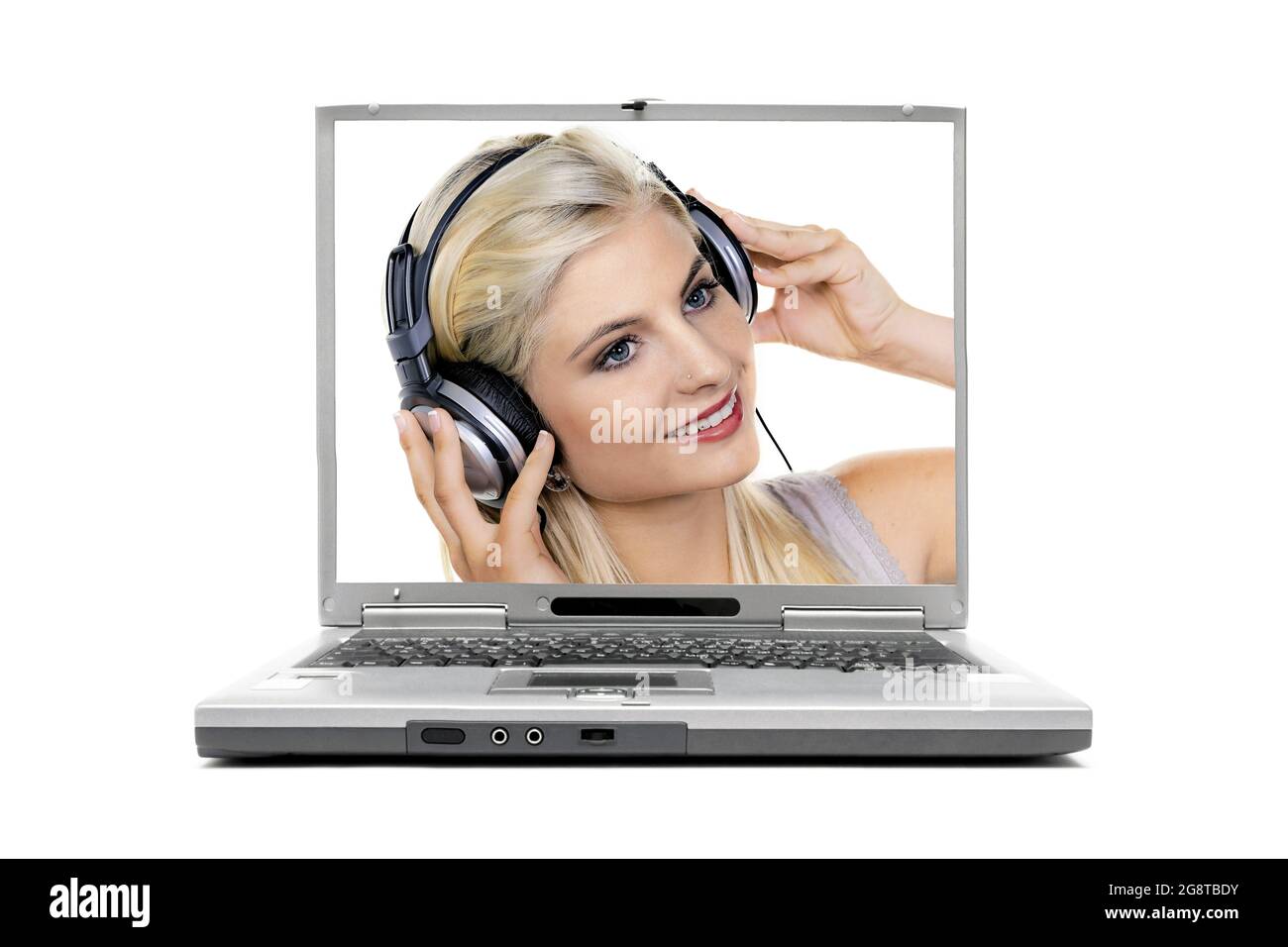 image 'woman with headphones listening to music' on a laptop display Stock Photo
