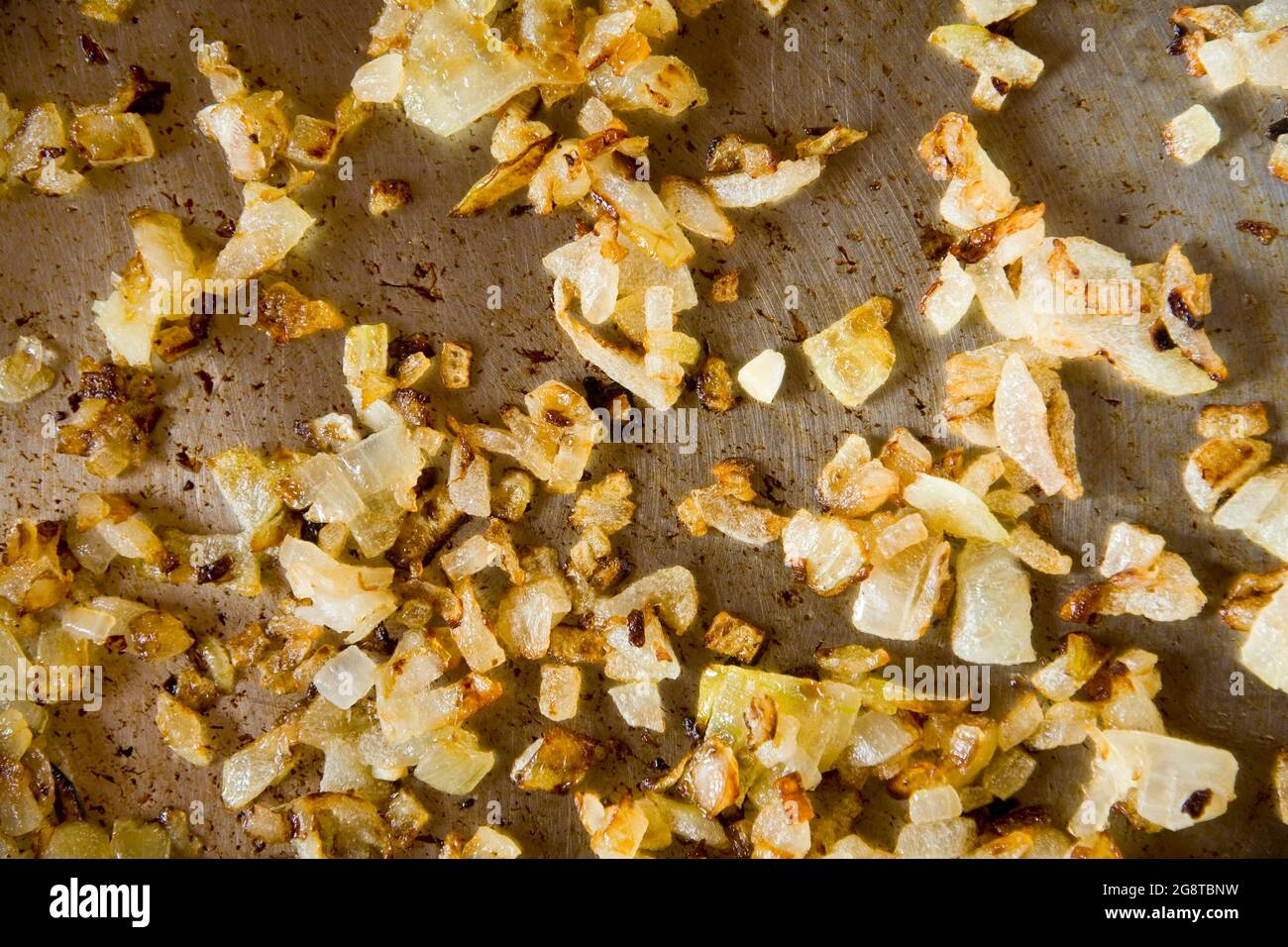 Roasted onion in pan Stock Photo