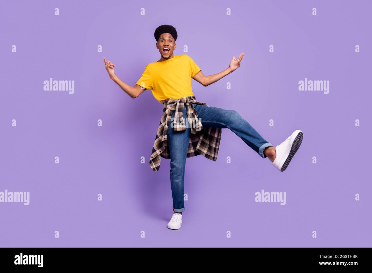 Full size photo of happy dark skin young man dance good mood wear tight ...