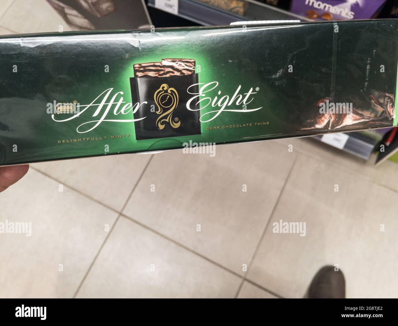 Picture of a chocolate box with the logo of atern Eight. After Eight Mint Chocolate Thins, often referred to as simply After Eights, are a brand of mi Stock Photo
