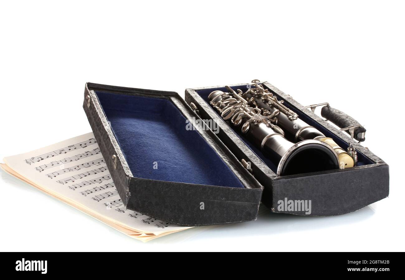 Antique in case and notebook with notes isolated on white