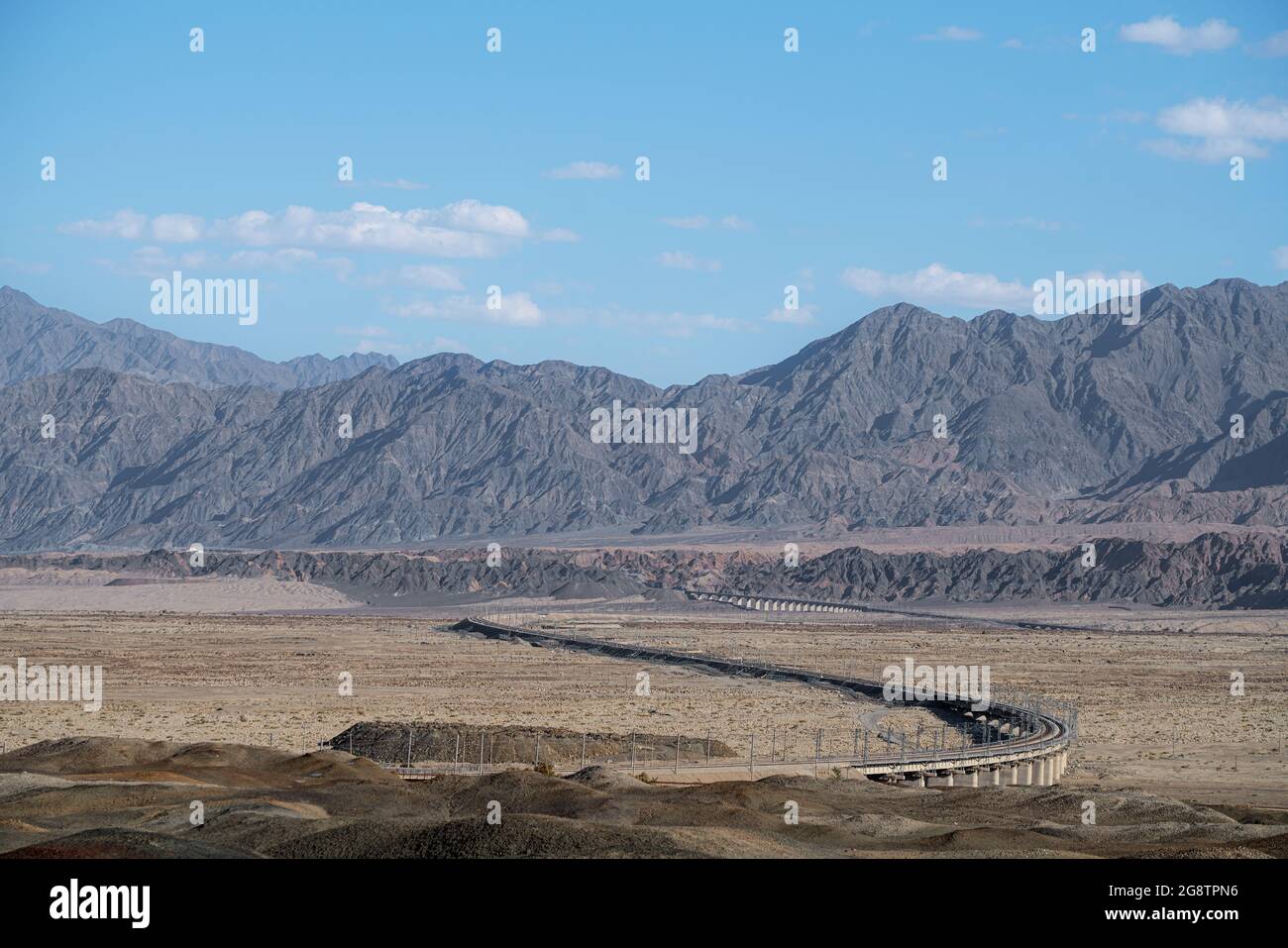 Desert and Railway, road construction. Shot in xinjiang, China. Stock Photo