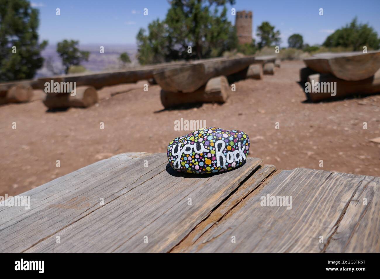 Wooden table with kindness rock Stock Photo