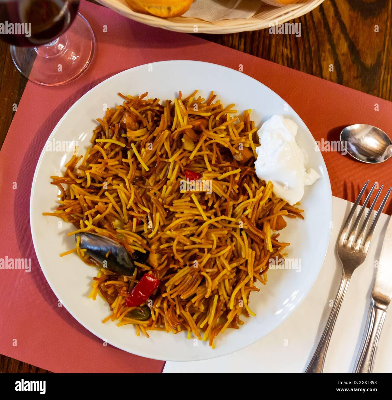 Paella with fideua, pasta noodles and seafood Stock Photo Alamy