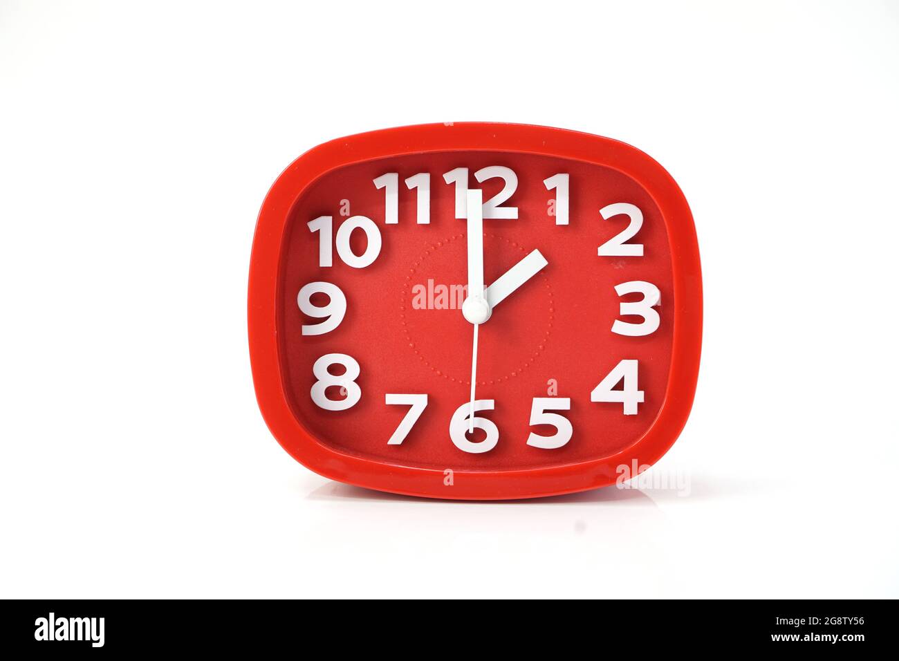 red alarm clock isolated on white background Stock Photo - Alamy