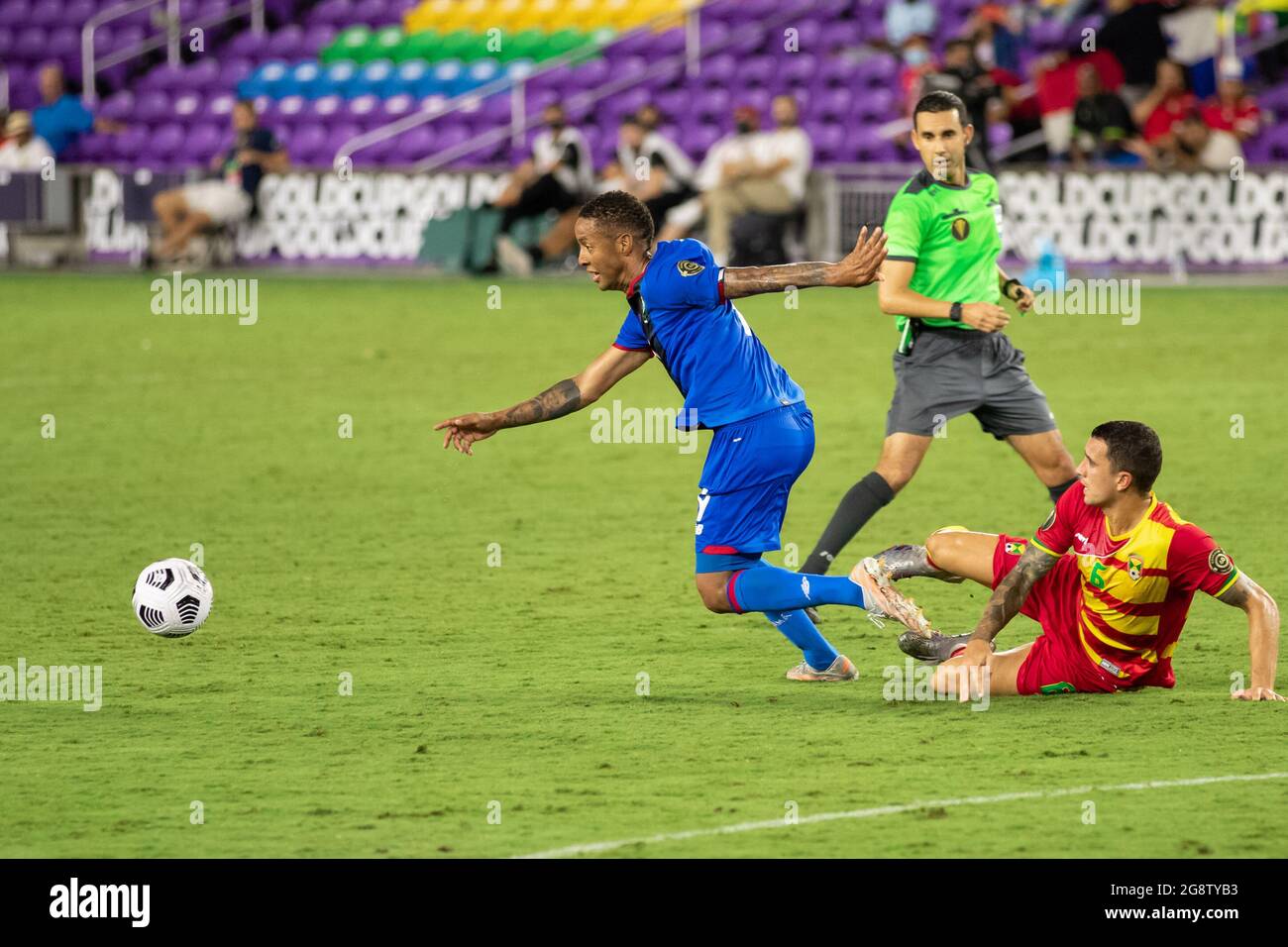 Orlando, United States. 21st July, 2021. Gabriel Torres (9 Panama) gets past Oliver Norburn (6 Grenada) during the CONCACAF Gold Cup game between Panama and Grenada at Exploria Stadium in Orlando, Florida. NO COMMERCIAL USAGE. Credit: SPP Sport Press Photo. /Alamy Live News Stock Photo