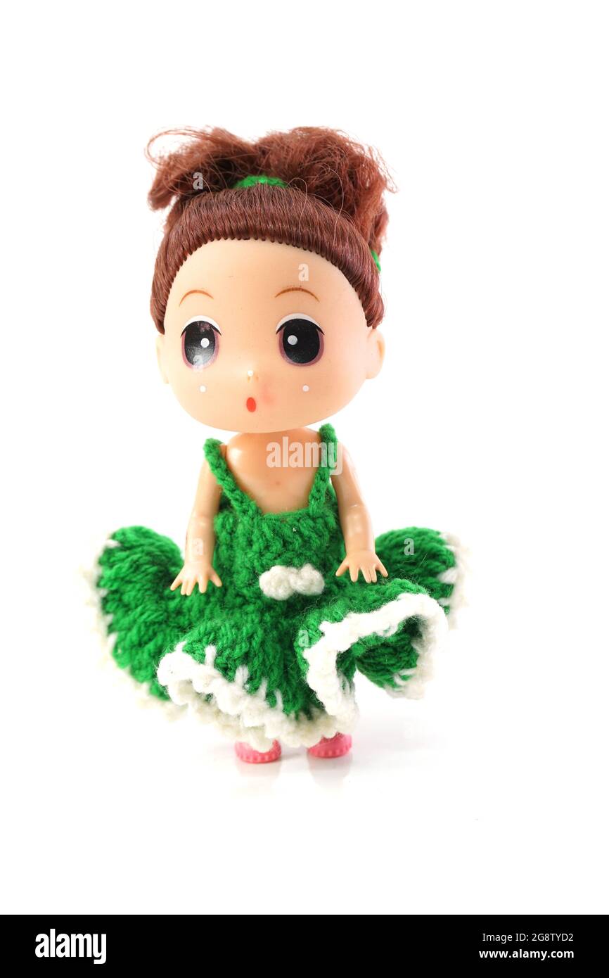 beautiful baby doll with dress isolated on white background Stock Photo