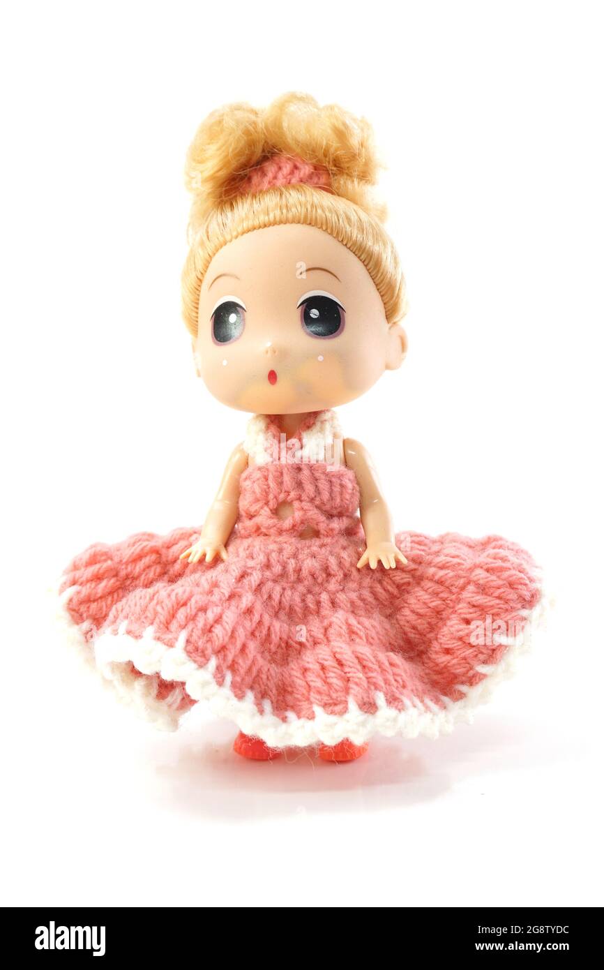 beautiful baby doll with dress isolated on white background Stock Photo