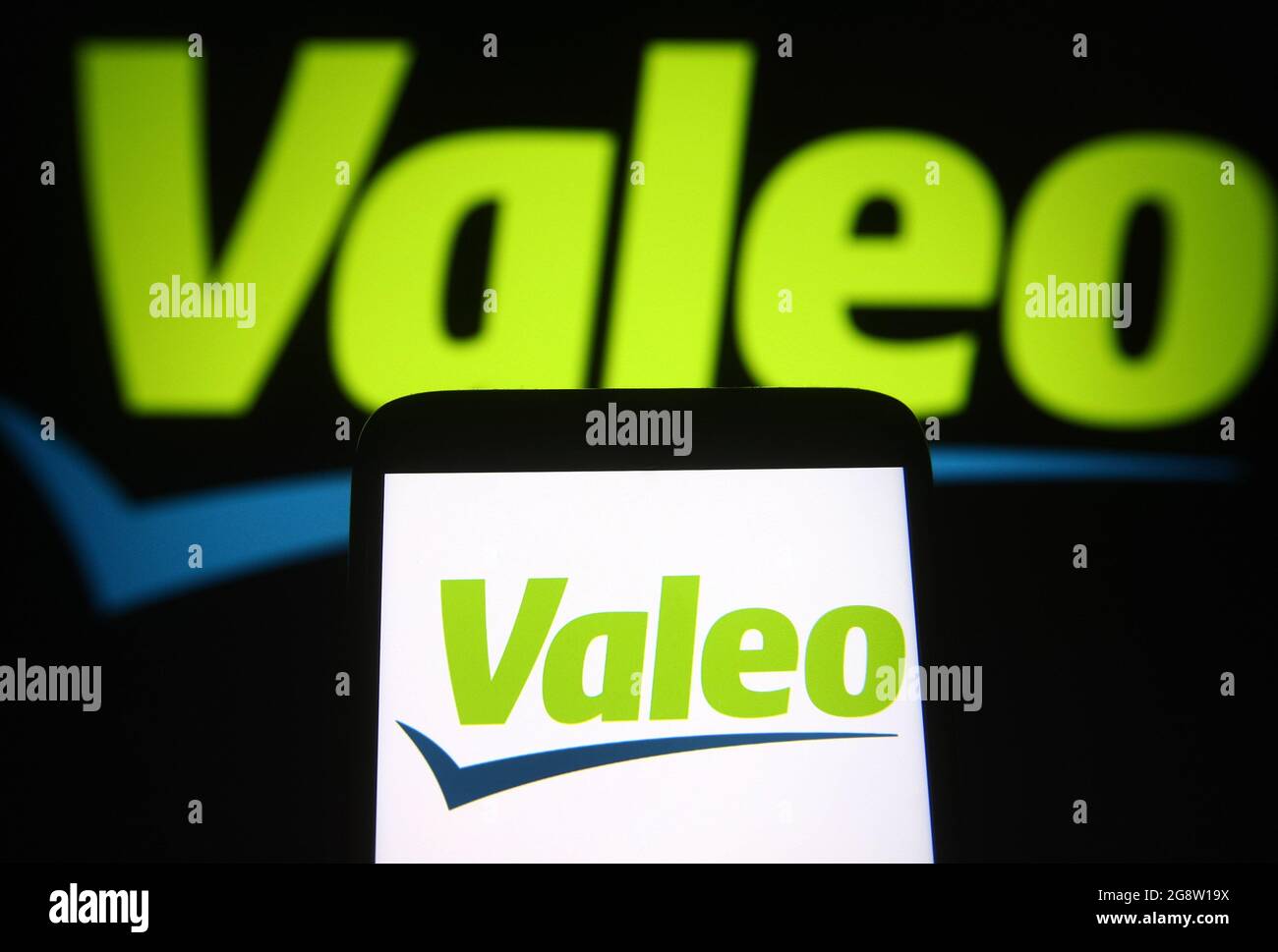 Ukraine. 23rd July, 2021. In this photo illustration a Valeo logo of a French automotive supplier is seen on a smartphone and a pc screen. (Photo by Pavlo Gonchar/SOPA Images/Sipa USA) Credit: Sipa USA/Alamy Live News Stock Photo