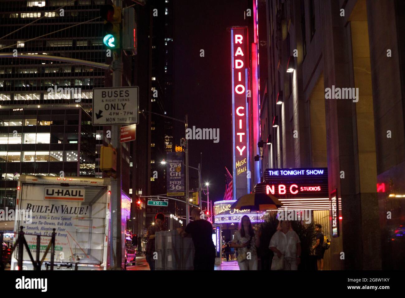 New York, United States. 17th July, 2021. Pedestrians walk past the Radio  City and NBC Studios marquees. Credit: SOPA Images Limited/Alamy Live News  Stock Photo - Alamy