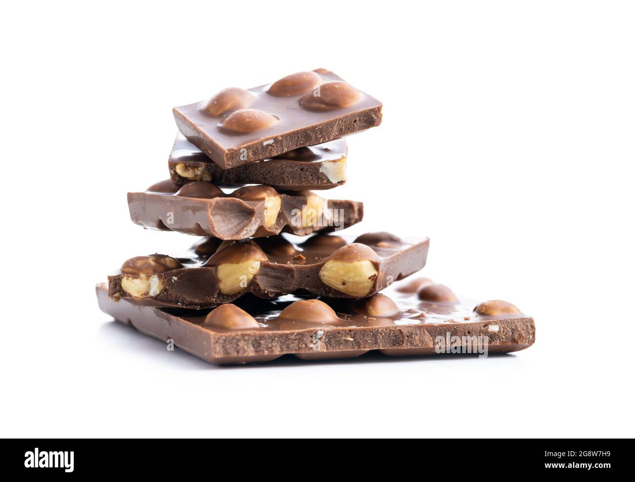 Nutty chocolate with hazelnuts isolated on white background. Stock Photo