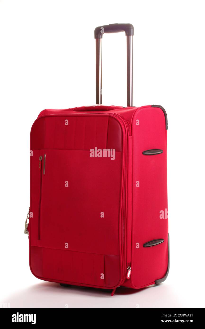 red travel bag isolated on white Stock Photo - Alamy