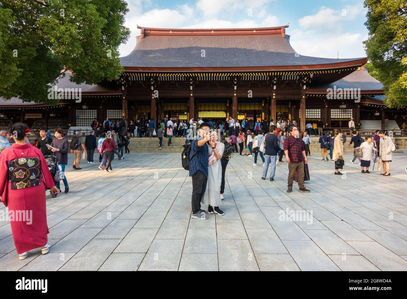 Meiji Shrine, Shibuya, Tokyo, Japan on a busy weekend with locals in traditional costume and tourists Stock Photo