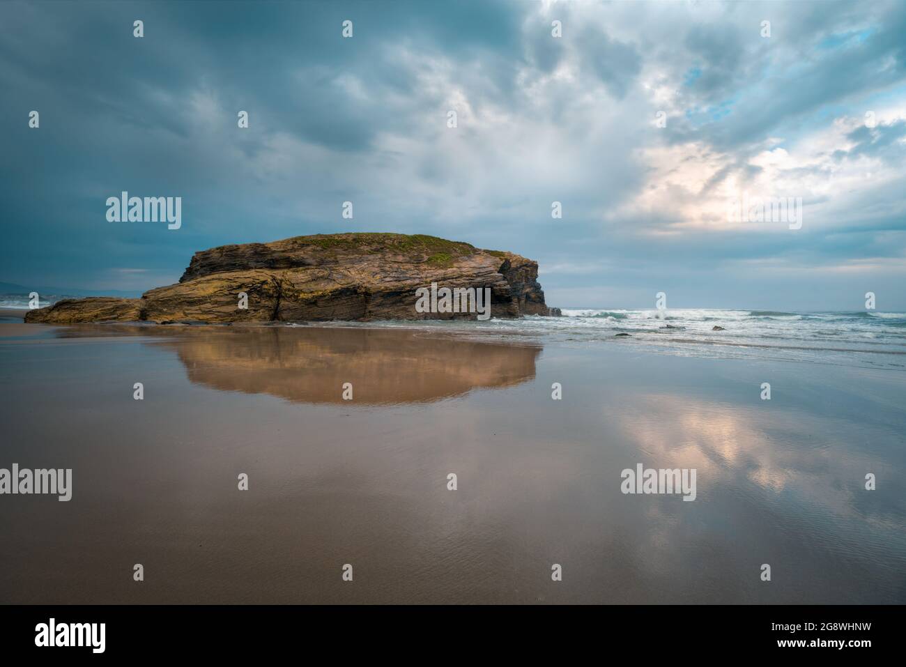Cloudy sky and low tide at As Catedrais beach in Ribadeo Lugo Galicia Stock Photo