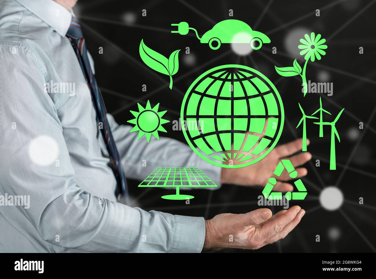Clean energy concept above the hands of a man Stock Photo - Alamy