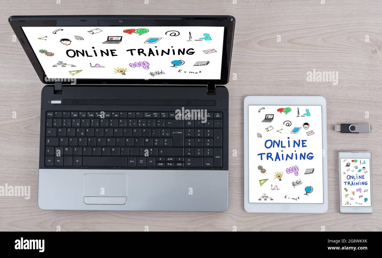 Online training concept shown on different information technology devices Stock Photo