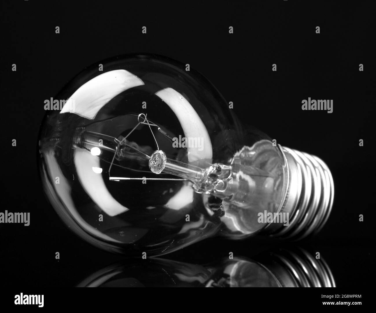 Light bulb on black background Stock Photo Alamy