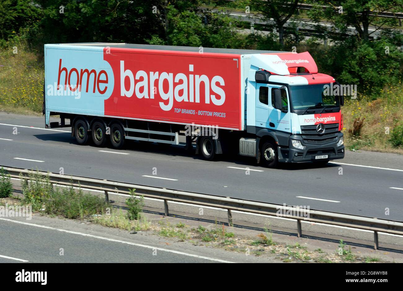 A Home Bargains lorry on the M40 motorway, Warwickshire, UK Stock Photo