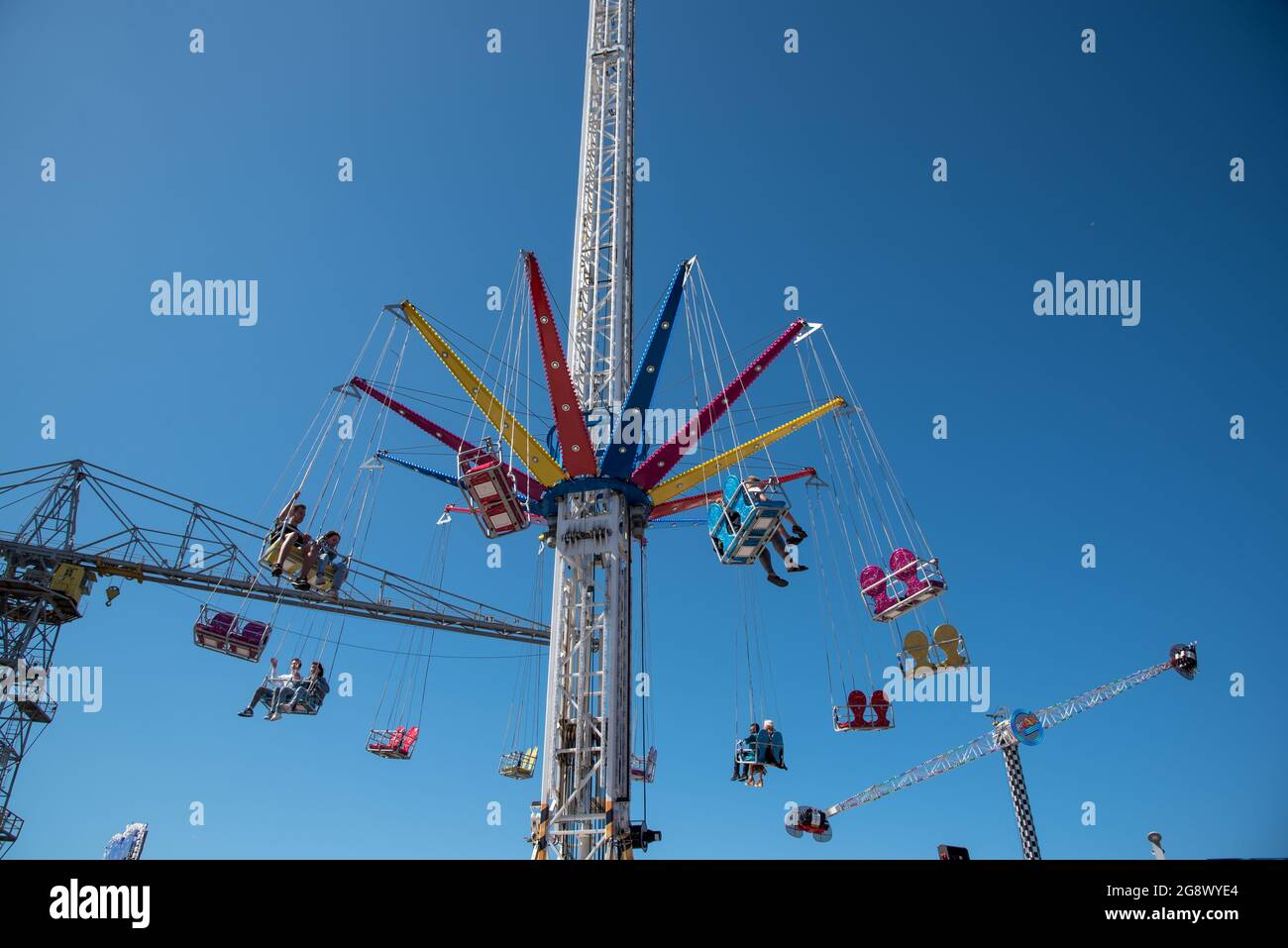 Den Helder, the Netherlands. 8 July 2021.Scenes of a fair with carousels and bumper cars. High quality photo Stock Photo