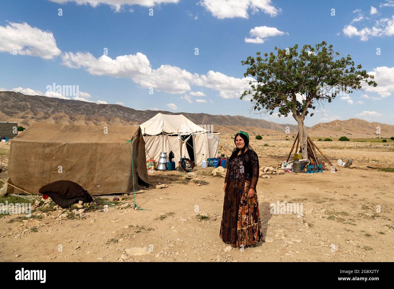Nomadic woman from Qashqai nomads in the countryside of Firuzabad, Iran Stock Photo
