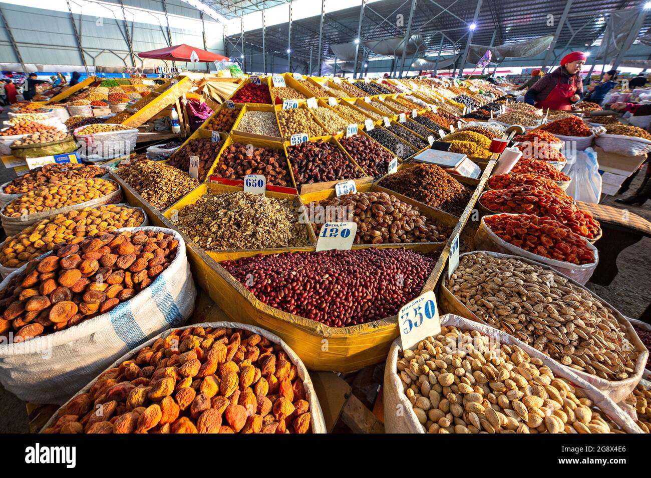 Stand of dried fruits in Osh Bazaar, Bishkek, Kyrgyzstan. Stock Photo