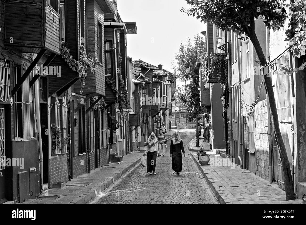 Street with historical wooden houses in Kadirga neighborhood, Istanbul, Turkey Stock Photo