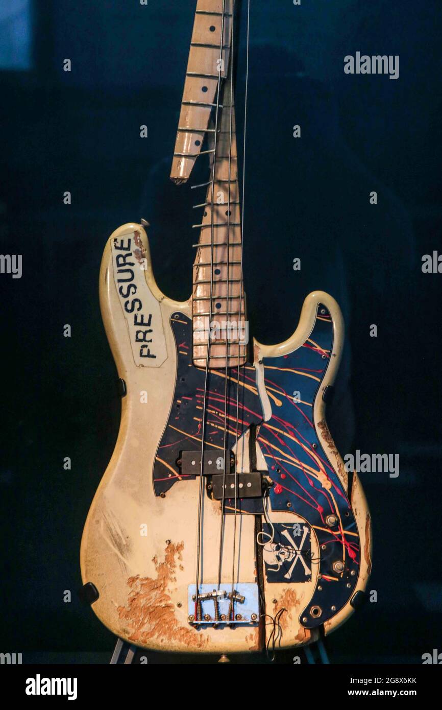 London UK 23 July 2021.This iconic bass was last played on stage at The Palladium in New York City on 20 September 1979, during The Clash’s ‘Take the 5th’ tour of North America. At the end of the show, Simonon smashed his guitar in a moment of frustration, which became an iconic symbol of rebellion. This moment was captured by Pennie Smith, whose photograph was subsequently featured on the cover of The Clash’s third album ‘London Calling’ released in the winter of 1979.Paul Quezada-Neiman/Alamy Live News Stock Photo