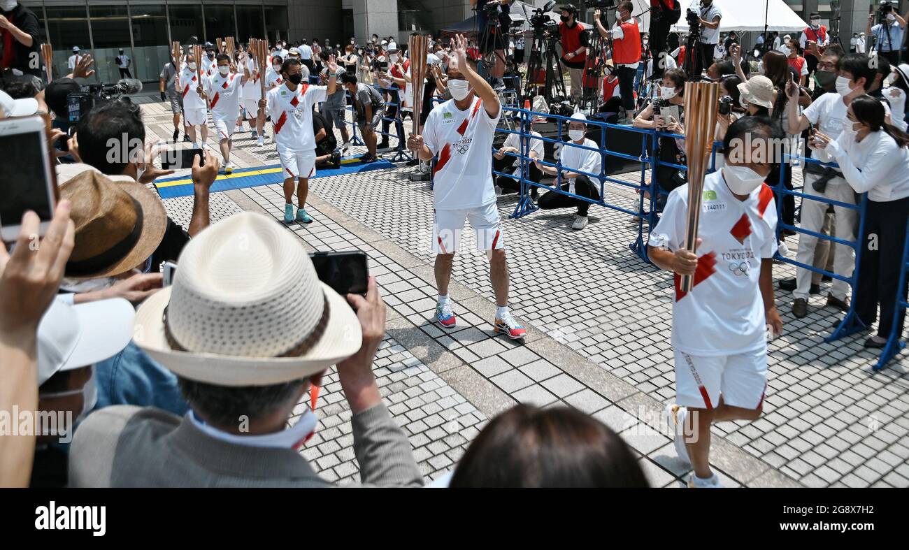Tokyo, Japan. 23rd July, 2021. Torchbearers arrive at citizen's plaza of the Tokyo Metropolitan Government office in Tokyo, Japan on Friday, July 23, 2021. Photo by Keizo Mori/UPI Credit: UPI/Alamy Live News Stock Photo