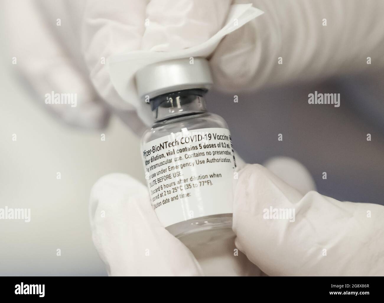 File photo dated 22/12/2020 of a Pfizer/BioNTech Covid-19 vaccine. An eight-week gap between the first and second doses of the Pfizer/BioNTech Covid-19 vaccine is a 'sweet spot' when it comes to generating strong immune response while protecting the UK population against the Delta variant of coronavirus, scientists have said. Issue date: Friday July 23, 2021. Stock Photo