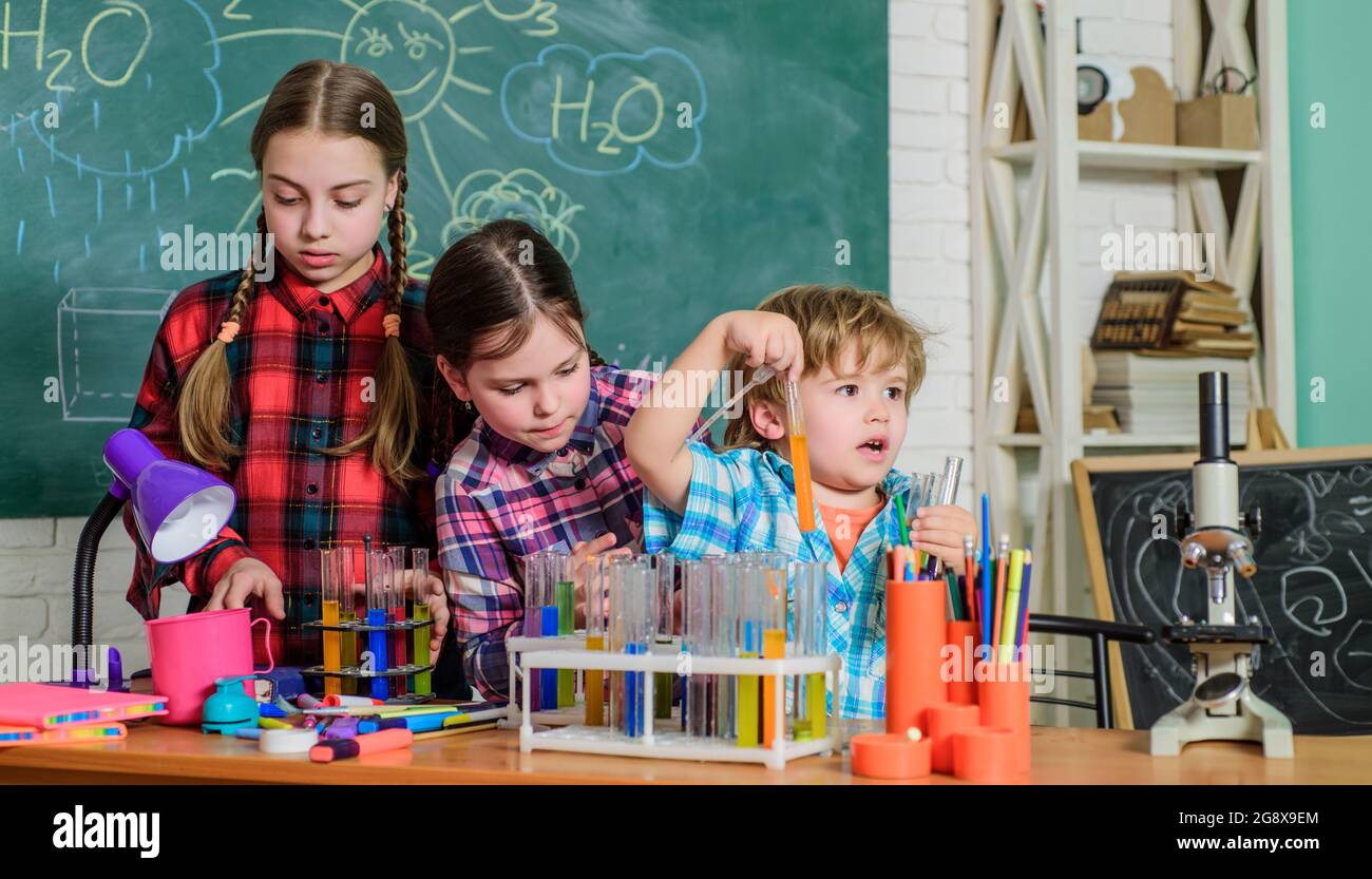 School chemistry laboratory. back to school. Science and education. chemistry lab. happy children. Laboratory Research - Scientific project For Stock Photo