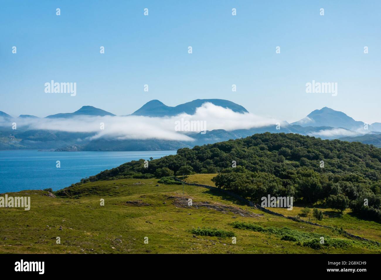 Loch Torridon on the Applecross Peninsula, Scotland, with the Torridon mountains in the background Stock Photo