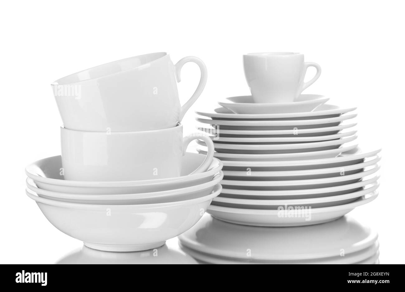 Clean plates and cups isolated on white Stock Photo Alamy