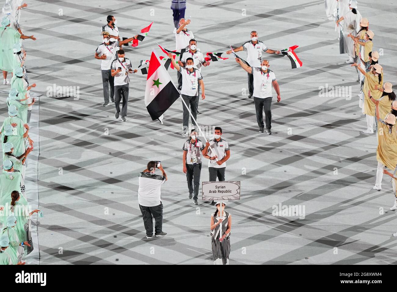 Tokyo, Japan. 23rd July, 2021. Olympic delegation of Syrian Arab Republic parade into Olympic Stadium during the opening ceremony of Tokyo 2020 Olympic Games in Tokyo, Japan, July 23, 2021. Credit: Xu Chang/Xinhua/Alamy Live News Stock Photo
