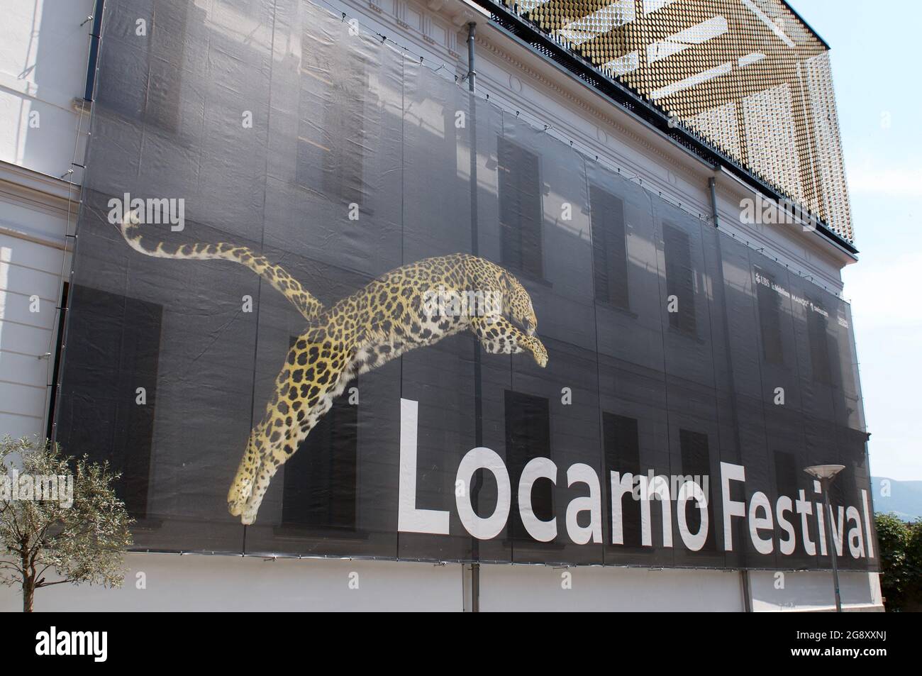 Locarno, Ticino, Switzerland - 21st July 2021 : Locarno Film Festival sign hanging on the facade of Palacinema Building in Locarno, Switzerland Stock Photo