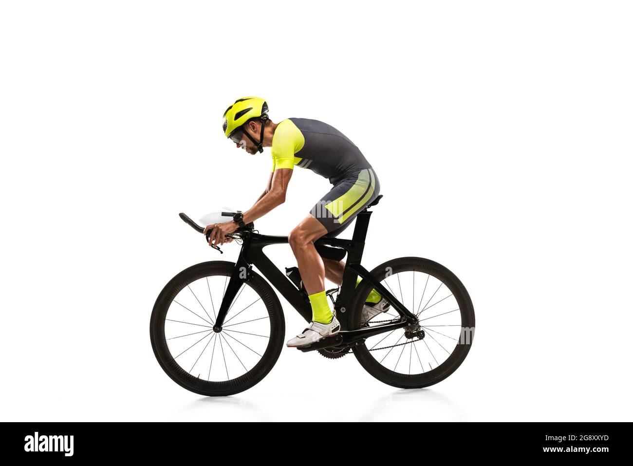 Young professional male bike rider on road bike isolated over