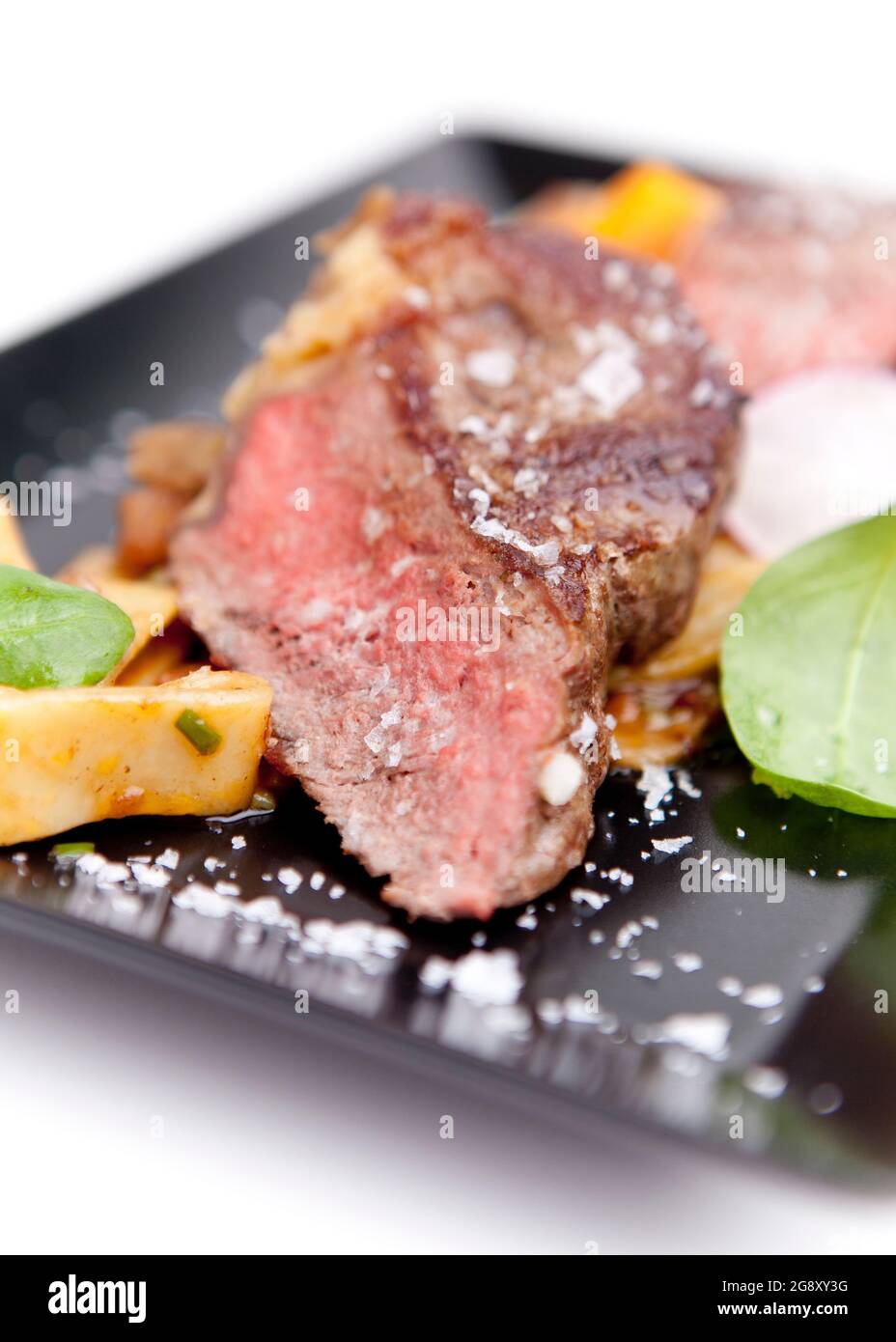 Ribeye steak with penne pasta. Meat, gourmet lunch English cuisine