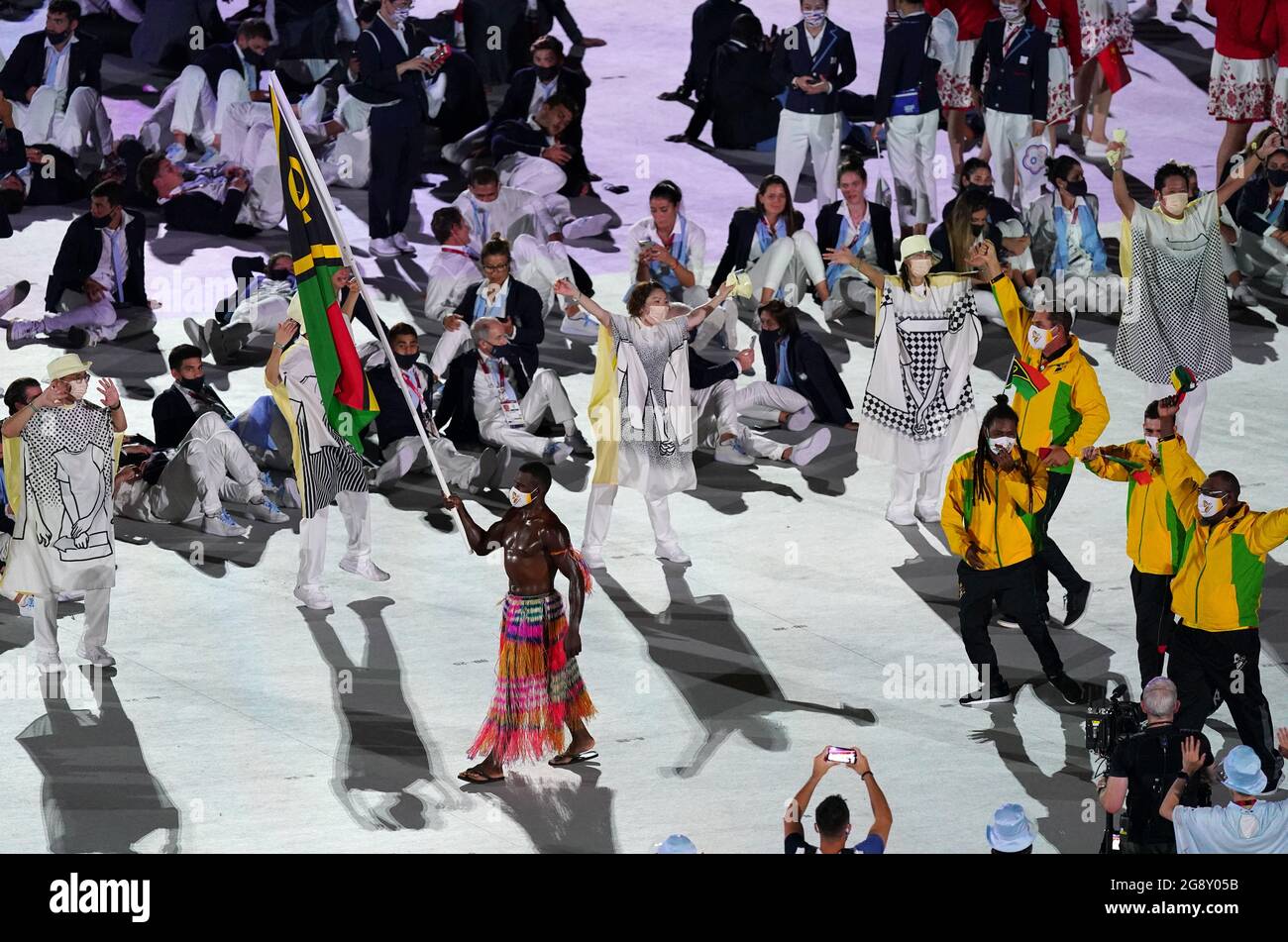 The Vanuatu Olympic team with Riilio Rii carrying the national flag