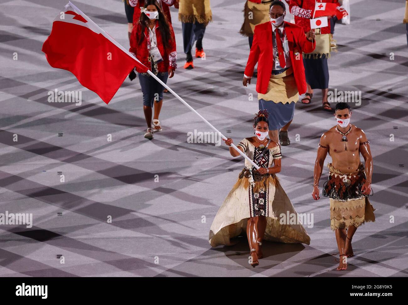 Tokyo 2020 Olympics - The Tokyo 2020 Olympics Opening Ceremony - Olympic  Stadium, Tokyo, Japan - July 23, 2021. Flag bearer Malia Paseka of Tonga  and PitaTaufatofua of Tonga lead their contingent