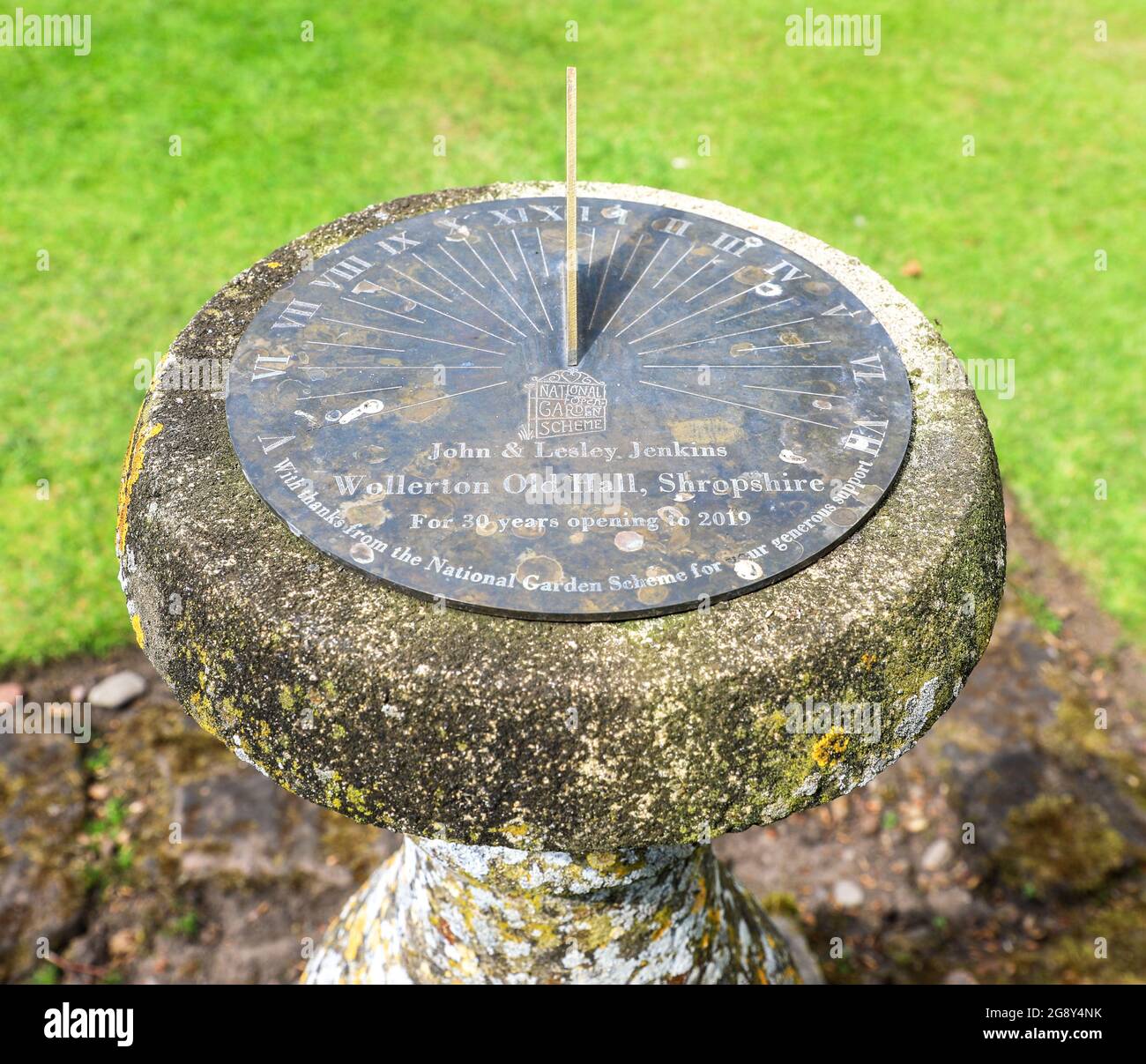 A sun dial presented by National Garden Scheme to Wollerton Old Hall Gardens for 30 years opening, Wollerton, Market Drayton, Shropshire, England, UK Stock Photo