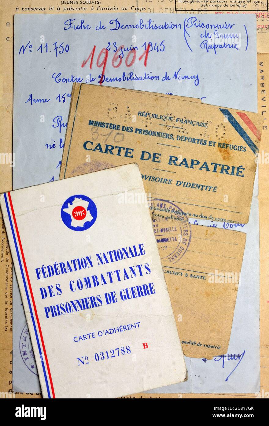 French military documents: Membership card of the Federation of Prisoners of War (WW2); official repatriation papers; letter of demobilisation; Stock Photo