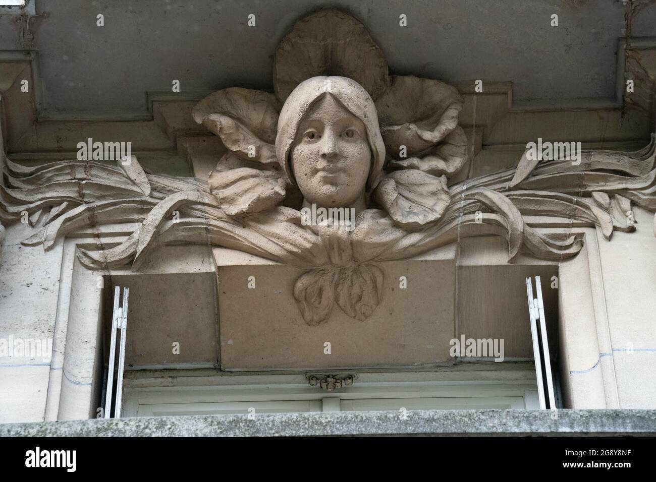 Paris Building Facade Sculpture Womans Head Front Entrance Stock Photo
