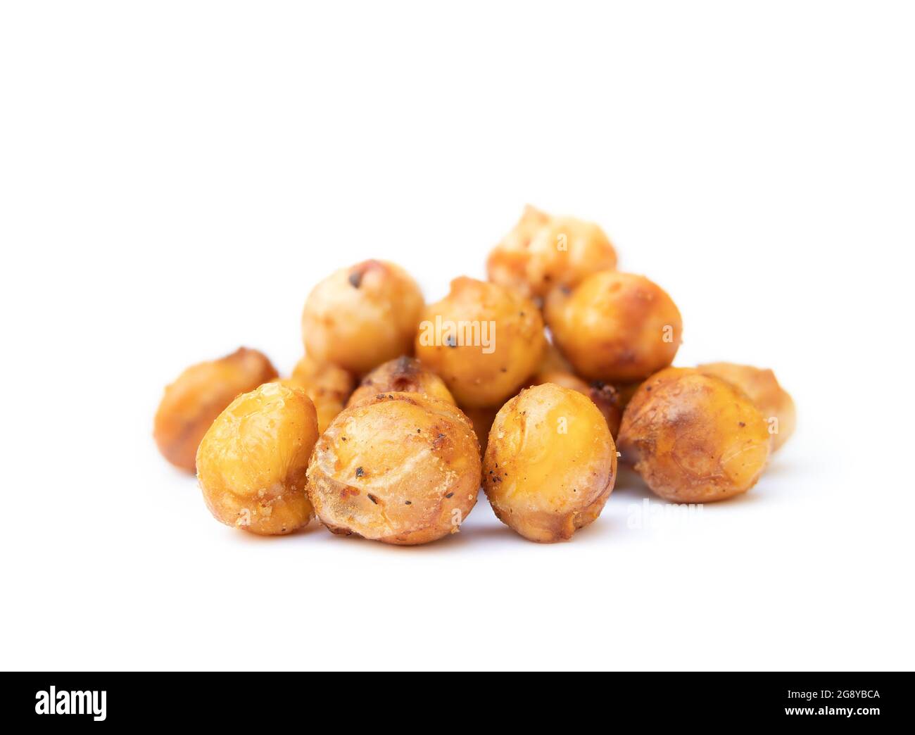Air fried chickpeas or garbanzo beans with spices. Pile of yellow golden fried chickpeas. Easy homemade recipe for a crispy and healthy protein snack. Stock Photo