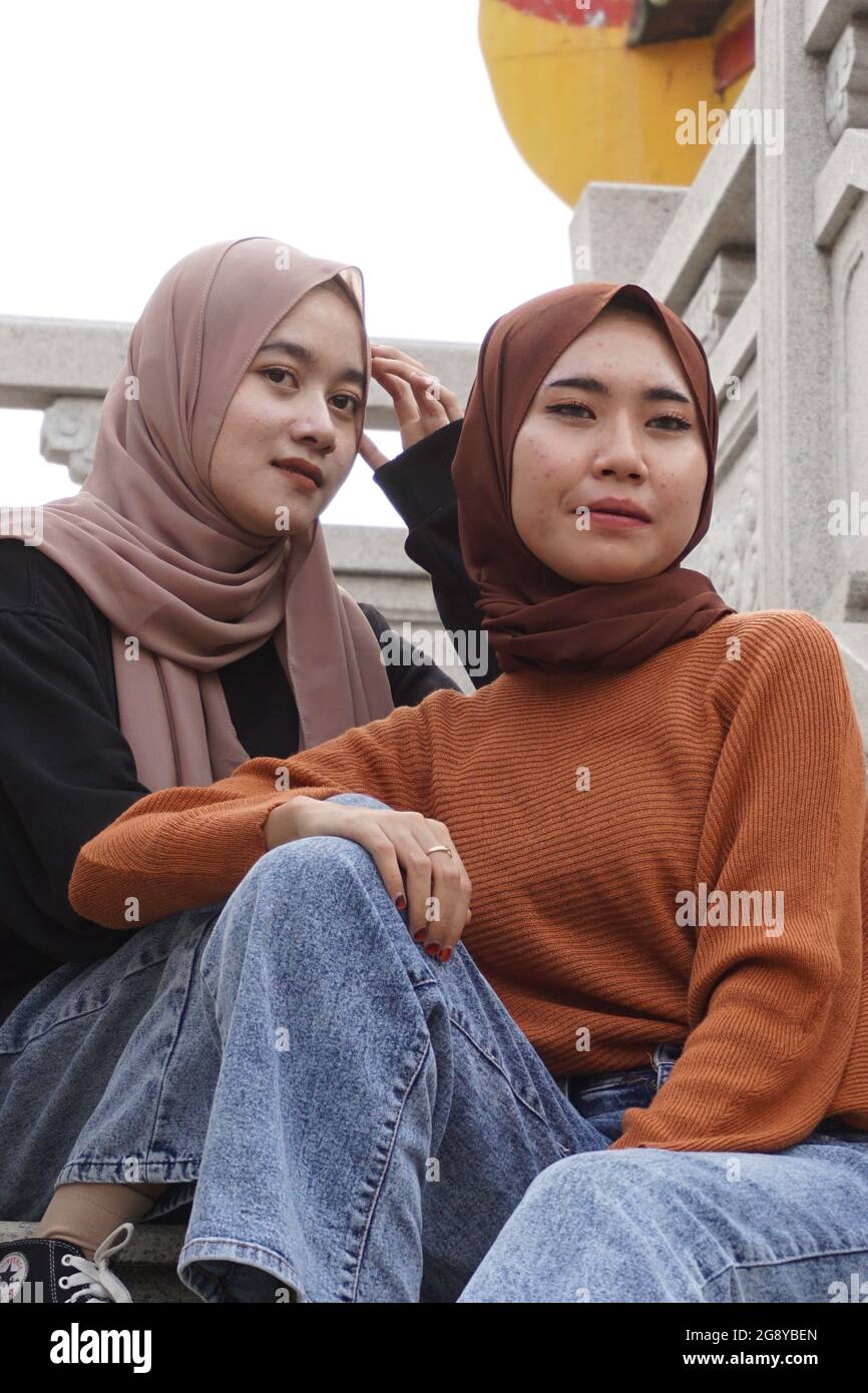 Two beautiful moslem girls with a natural background. The girls ...