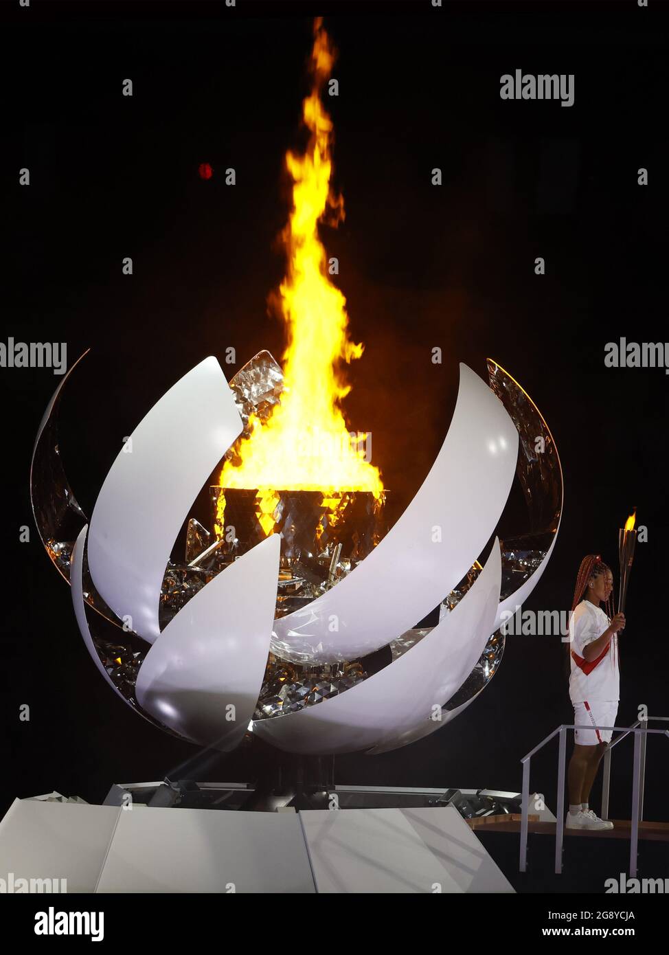 Tokyo, Japan. 23rd July, 2021. Japanese tennis star Naomi Osaka lights