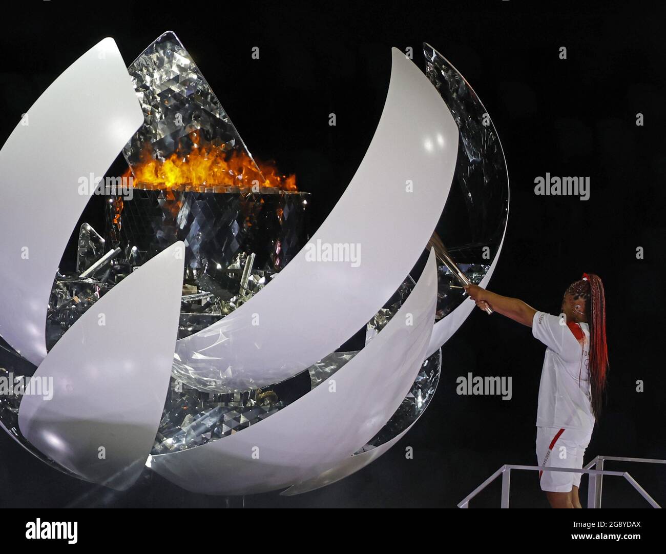 Tokyo, Japan. 23rd July, 2021. Japanese tennis star Naomi Osaka lights