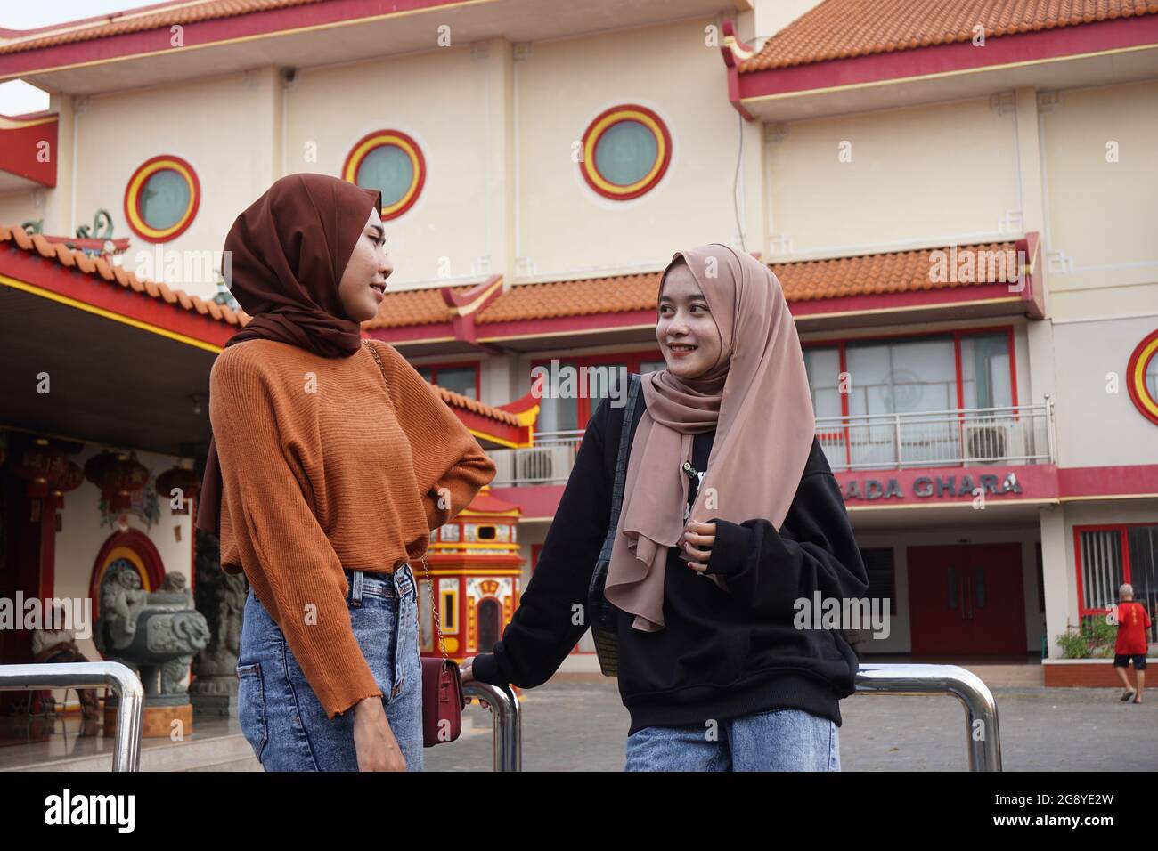 Two beautiful moslem girls with a natural background. The girls ...