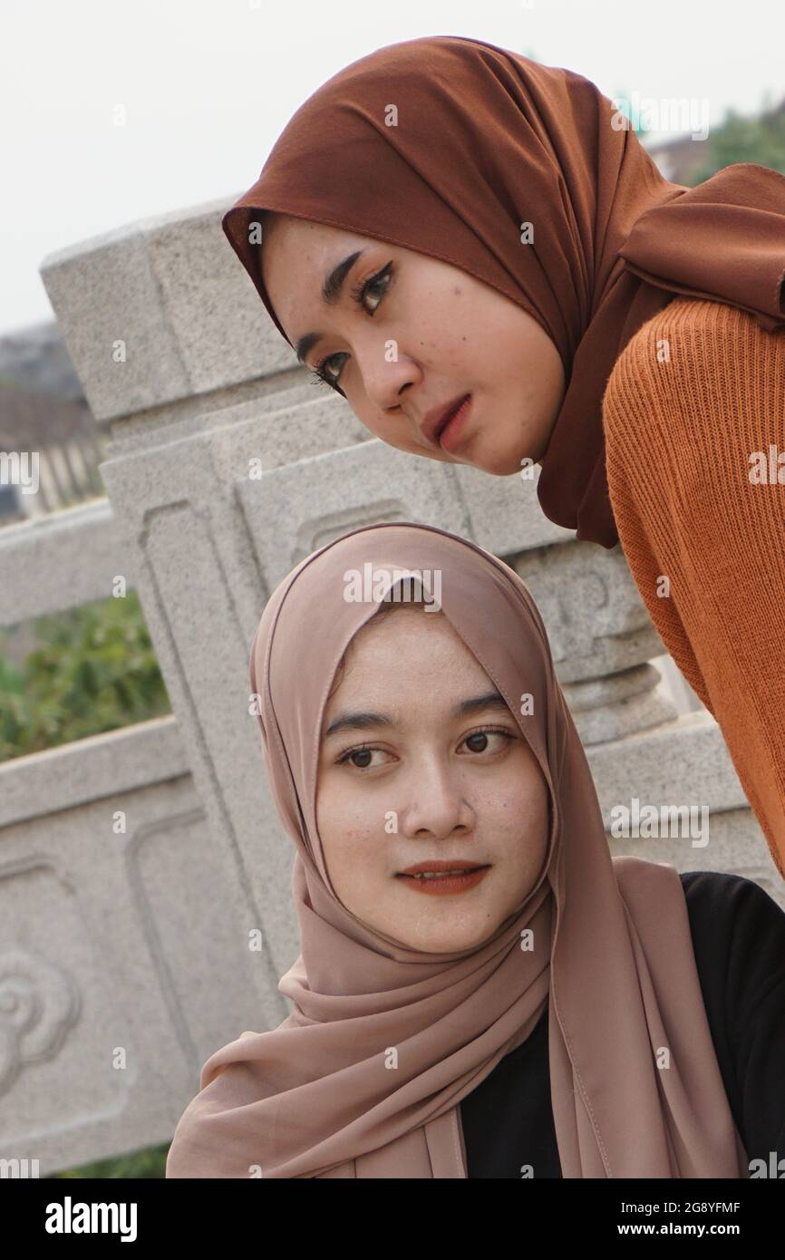 Two beautiful moslem girls with a natural background. The girls ...